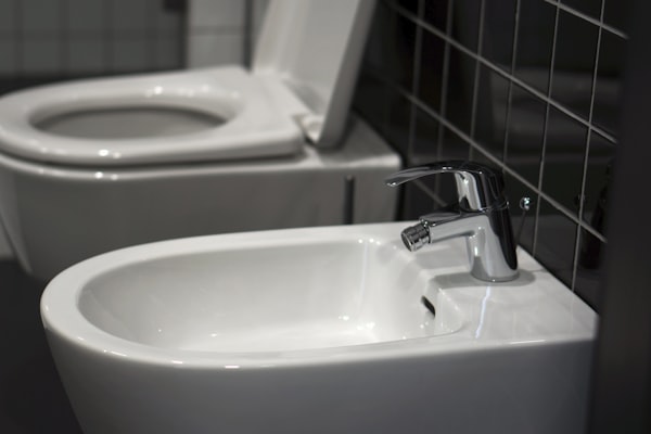 Clean bathroom plumbing fixtures